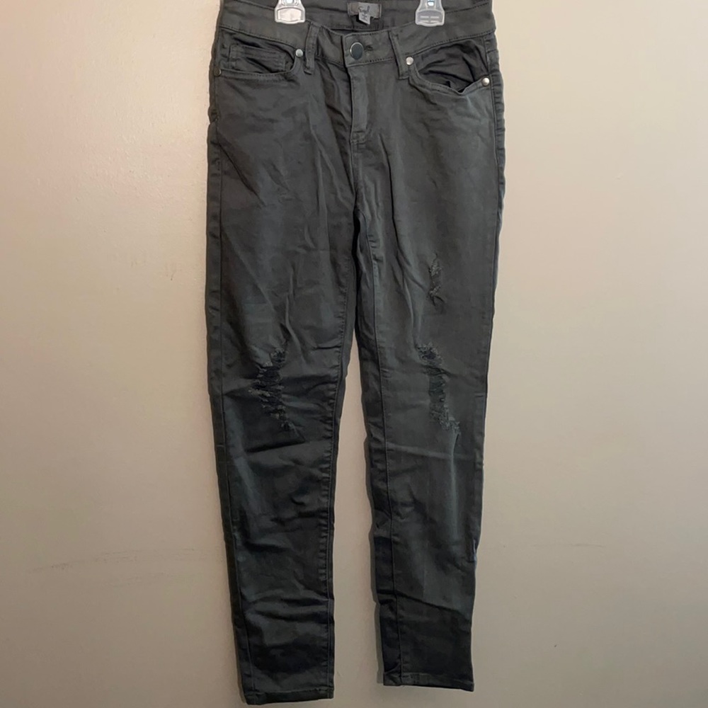 Grey distressed skinny jeans